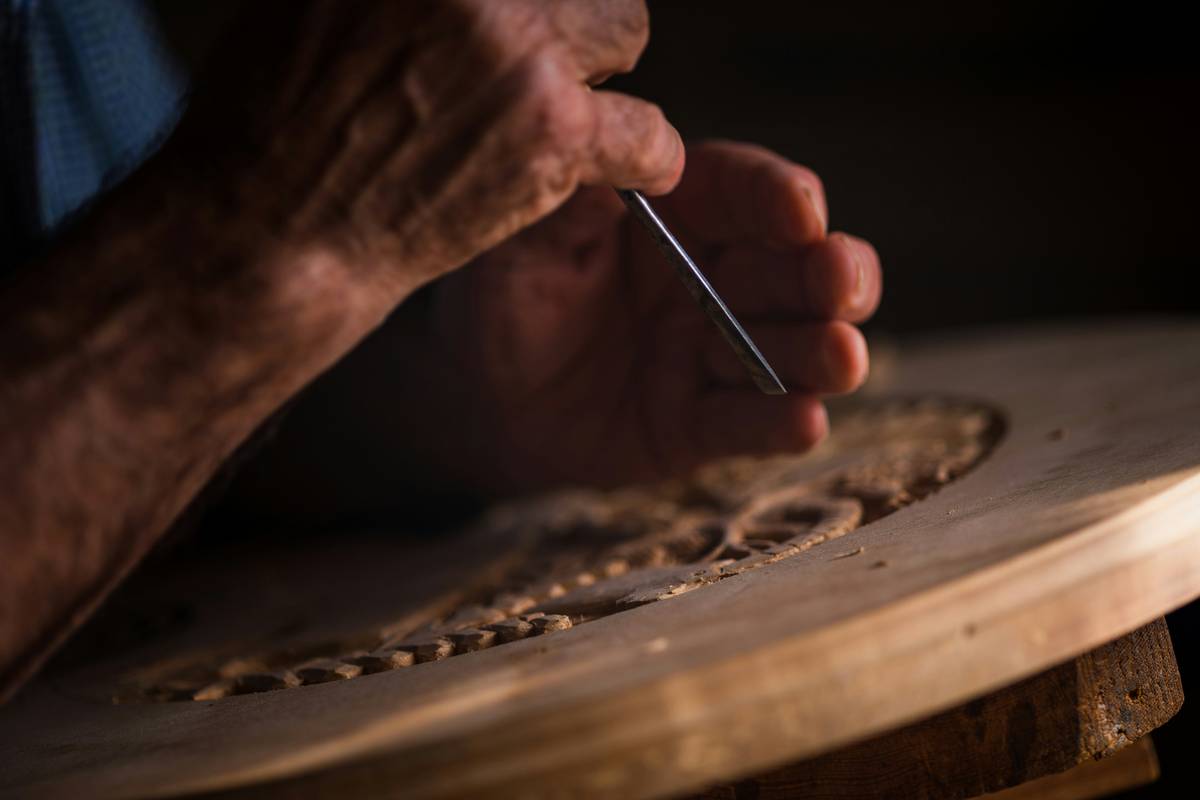 Close-up of handmade wooden keepsake boxes with dovetail joints and natural oil finish