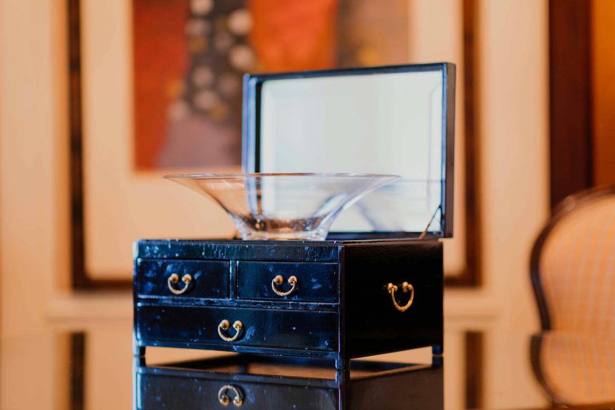 what to do with watch boxes: velvet-lined wooden box holding vintage cufflinks and a handwritten note